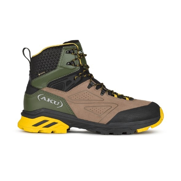Side view of AKU Reactive GTX Men's Hiking Boots on a rocky trail, highlighting the suede leather and traction sole.