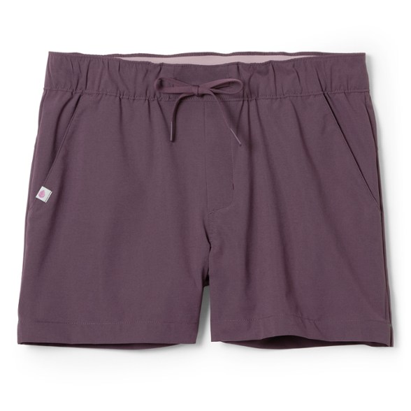 Side view of Summit Adventure women's hiking shorts showing 4-way stretch fabric on a hiking trail.