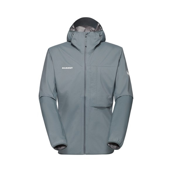 Front view of the men's SummitFlow UltraShell hiking jacket worn on a misty trail