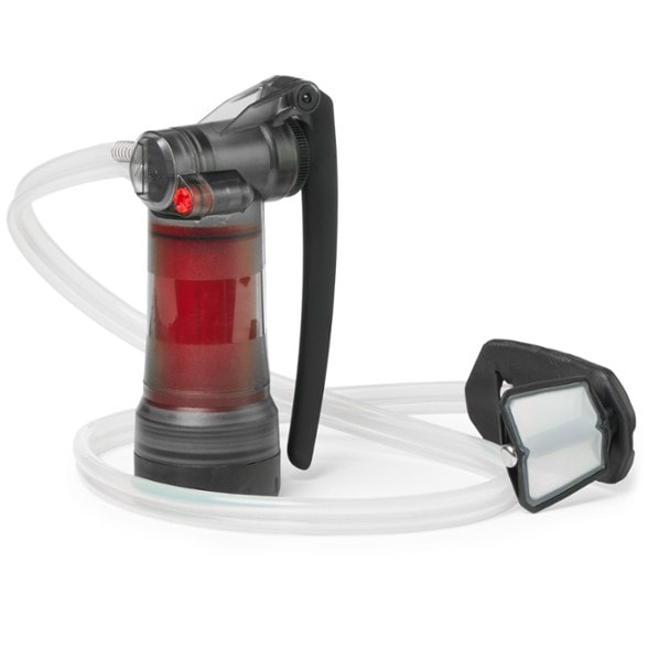 Guardian Travel Water Purifier in action on a hiking trail.