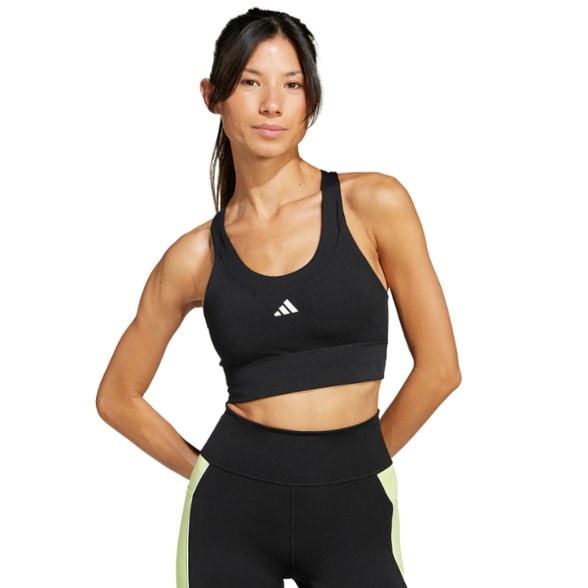 Adidas Women's Pocket Sports Bra side view highlighting its sleek design and pockets.