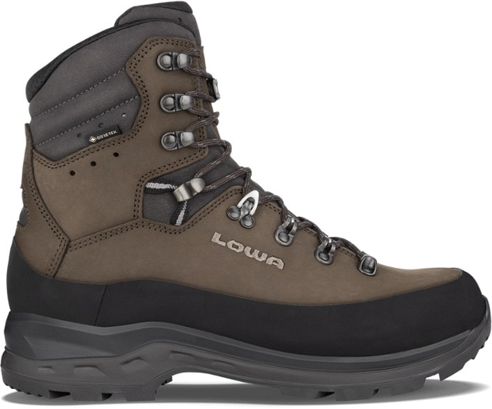 Lowa Tibet Evo GTX Men's Hiking Boots showing the side view on rocky terrain.