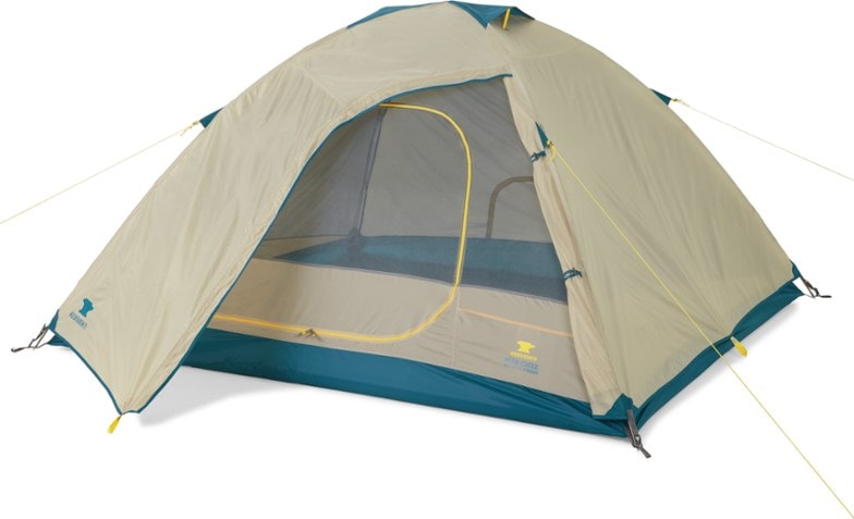 Mountain Haven 4-Person Tent set up at a music festival with gear stored in vestibule.