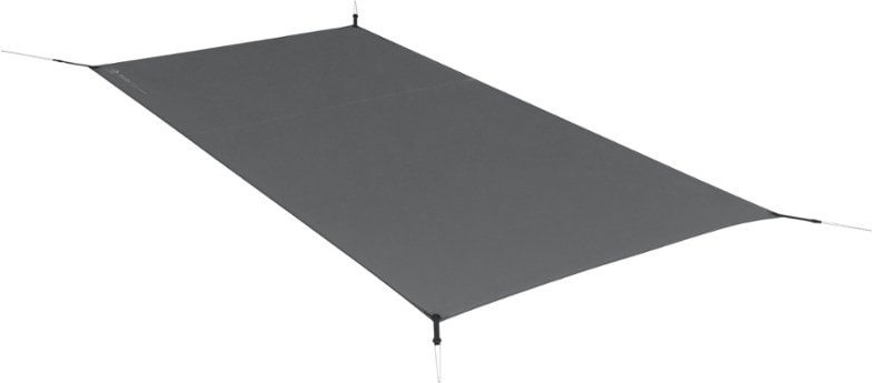 Telos TR3 Ultralight Tent Footprint laid out on the ground, showcasing its lightweight design and durability.