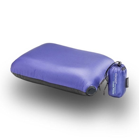 CloudRest Ultra-Light Inflatable Travel Pillow against a scenic camping backdrop.