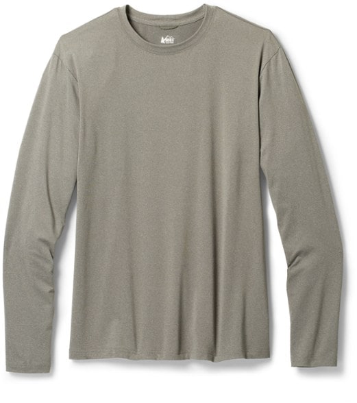 Eco-Friendly Sahara long sleeve hiking shirt displayed outdoors, highlighting its moisture-wicking feature.