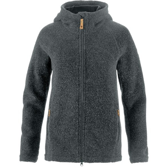 Kaitum full-zip fleece hoodie for women in a scenic mountain backdrop, showcasing its warmth and comfort.