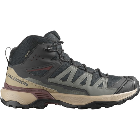 Side view of Salomon X Ultra 360 Mid GORE-TEX Men's Hiking Boots on rocky terrain.
