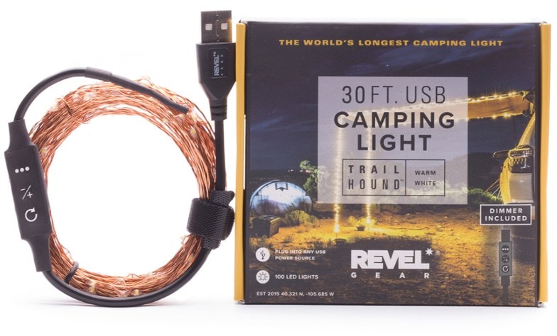 Trail Hound LED string lights illuminating a campsite at night.