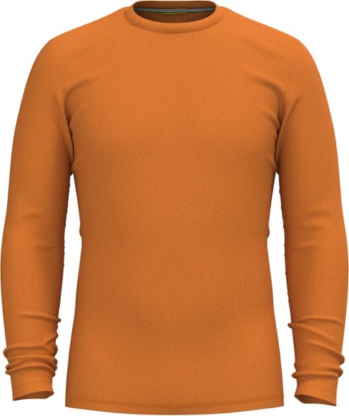 Men's thermal crew top in action during a skiing trip, showcasing its warm fit.