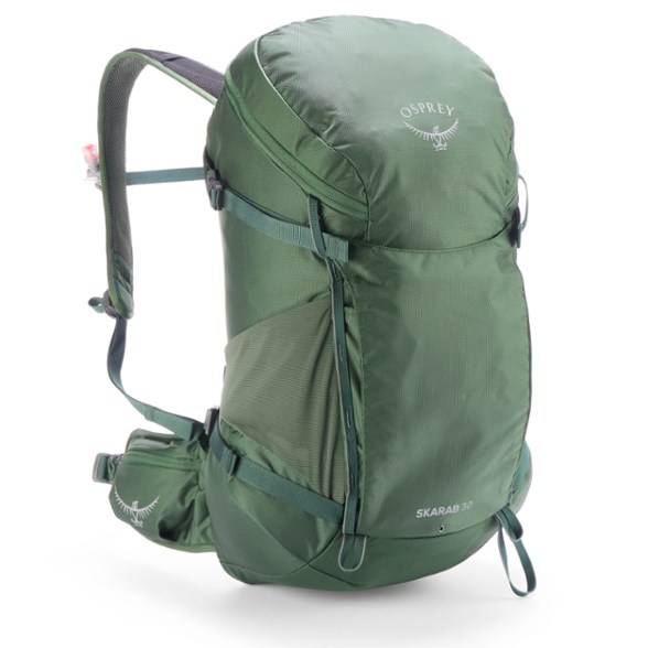Side view of Skarab 30L men's hydration pack showing adjustable straps and hydration reservoir port
