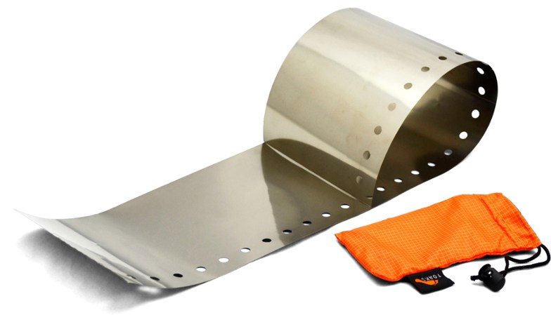 Side angle of the TOAKS titanium windscreen unfolded on a rock surface near a camp stove