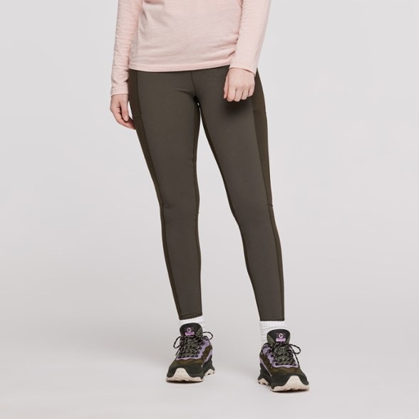 Front view of Cotopaxi Verso TrailFlex leggings showing high-rise fit and thigh pocket - women's activewear