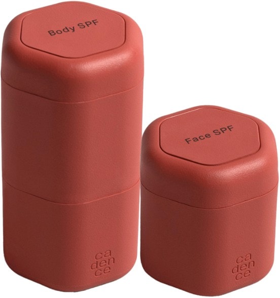 Close-up of Cadence Travel Sun Care Set showing the Large and Medium Flex Capsules.