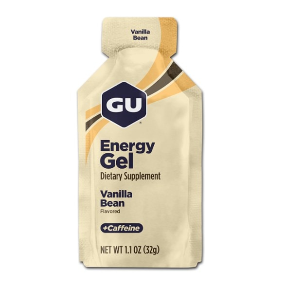 GU Energy Gel packet in an outdoor running setting, showcasing its use for marathon runners.