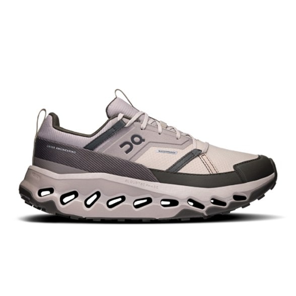 Cloudhorizon Women's Waterproof Hiking Shoes on a wet trail, demonstrating grip and stability.