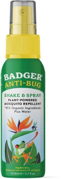 Nature's Shield mosquito repellent spray bottle with woody citrus aroma, perfect for outdoor use.