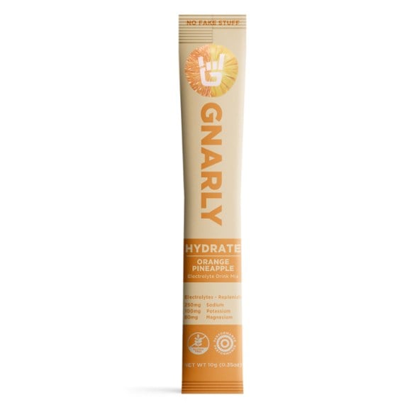 Close-up of Gnarly Hydrate+ low sugar sports drink mix packet with hydration powder for intense workouts
