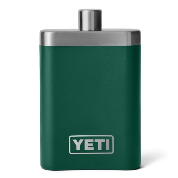 Front view of the adventure-ready 7 oz leakproof stainless steel flask with a natural backdrop.