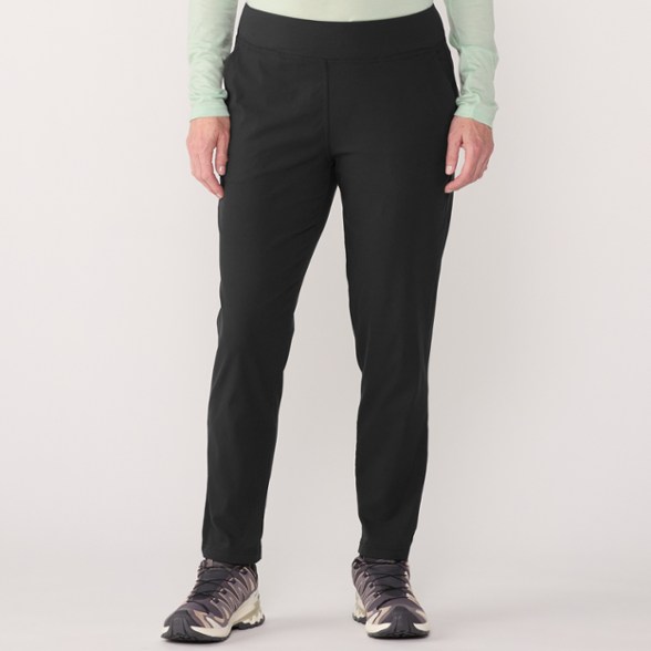 Close-up view of women's stretchable hiking pants showcasing the fabric texture and water resistance.