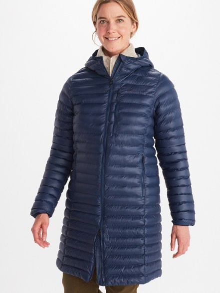 Front view of the women's insulated jacket showcasing its stylish design and fixed hood.