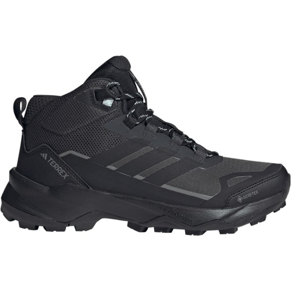 Side view of Adidas Women's GORE-TEX Skychaser AX5 Hiking Boots, highlighting the mesh and synthetic overlays.