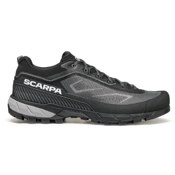 Scarpa Rapid LT approach shoes showcasing the Vibram Megagrip sole from a side angle.
