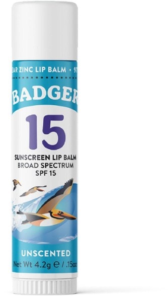 Close-up of SolarShield SPF lip balm tube with clear labeling and organic claims