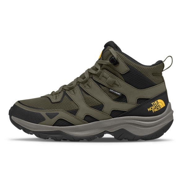 Side view of men's waterproof boots tackling rocky trail terrain