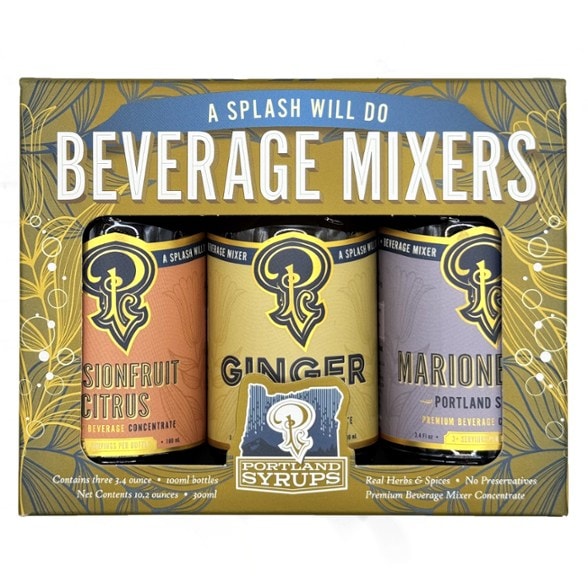 Ginger syrup bottle from Flavor Fusion Mixers Set on a rustic table.