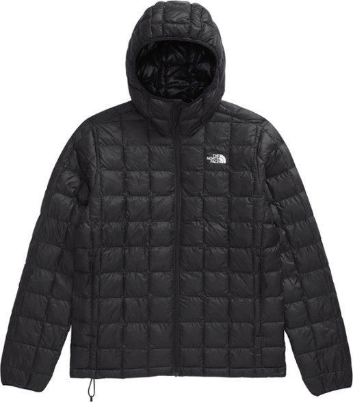 North Face ThermoBall Eco Insulated Hoodie on a hiking trail, showcasing its stylish design and practicality.