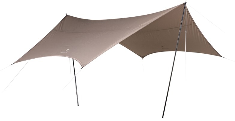 Outdoor Haven Tarp Set pitched in a campsite, protecting against rain and wind.