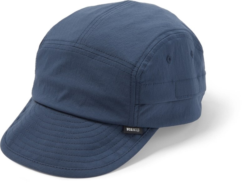 Side view of lightweight moisture wicking cap with adjustable closure, perfect for hiking