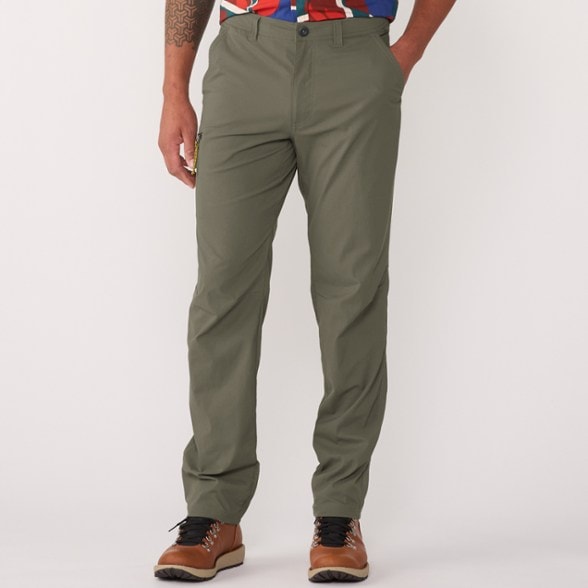 Men's Trailblazer Quick-Dry Hiking Pants in action on a mountain trail.