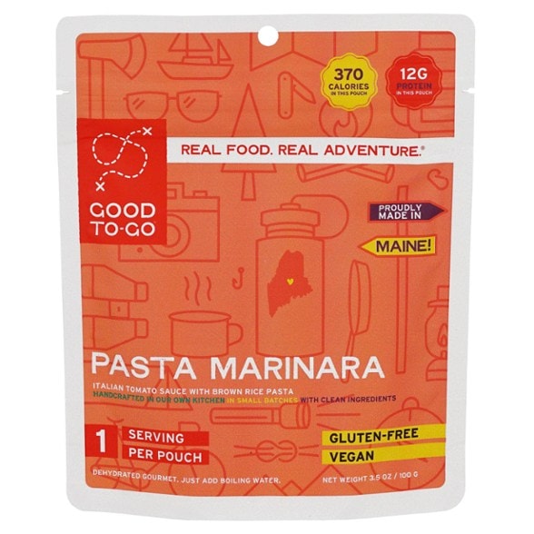 Angle view of GOOD TO-GO brown rice pasta marinara meal ready to serve on a camp plate
