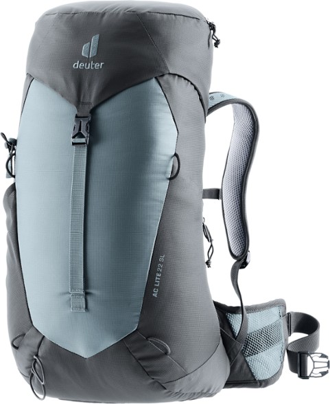 Deuter AC Lite 22 SL women's hiking backpack in use on a trail, showcasing its comfort and fit.