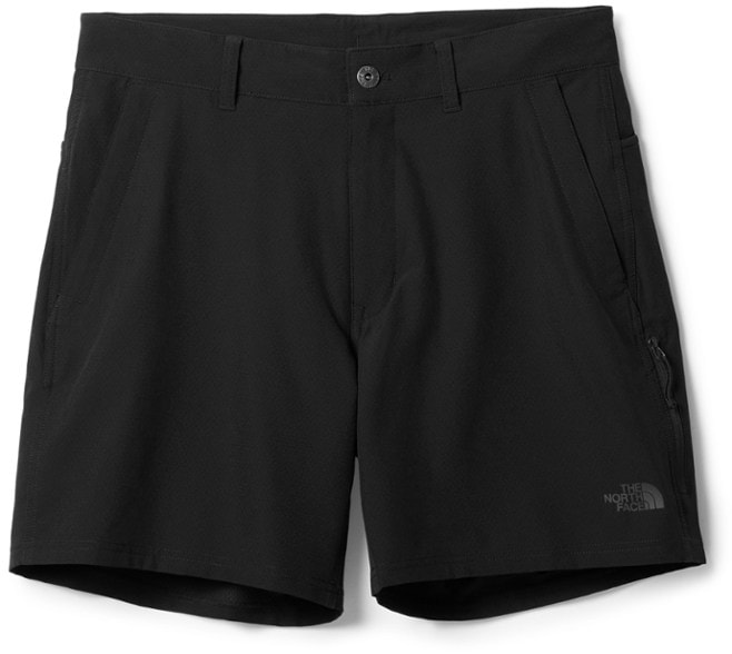 Front view of men's hiking shorts with zip pockets and drawstring waist, styled for summer travel