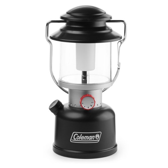 Coleman Classic 800 Lumens Rechargeable LED Lantern placed on a picnic table during a camping trip.
