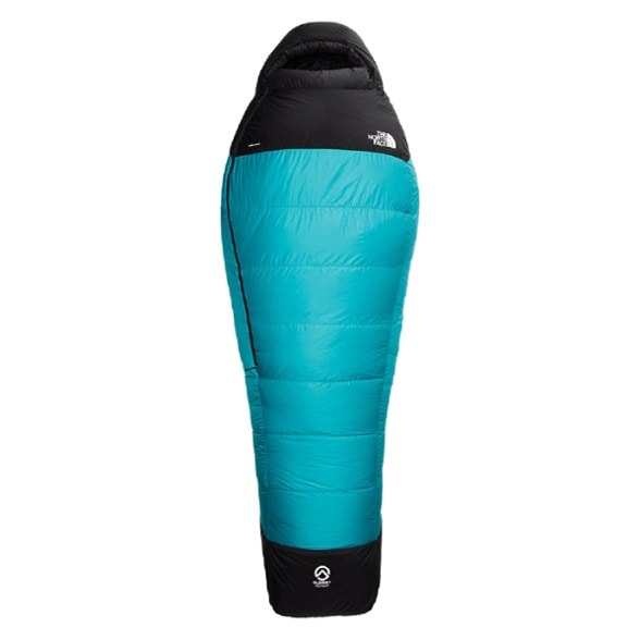 Inferno Alpine 15F sleeping bag fully zipped on rocky alpine terrain, showcasing lightweight backpacking gear