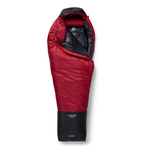 Mountain Hardwear Phantom WINDSTOPPER sleeping bag in snowy alpine setting, showcasing its durable design and insulation features.