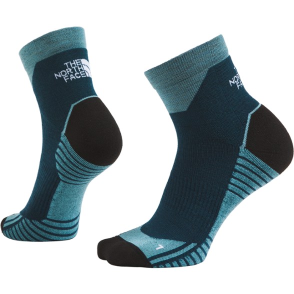 Close-up of merino wool hiking quarter socks showcasing cushioning and ribbed top.