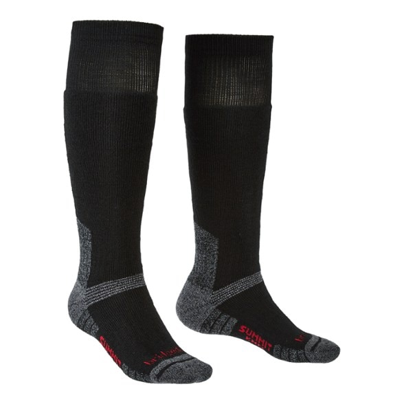 Bridgedale Explorer thermal knee socks displayed in a winter landscape, showcasing their warmth and durability.