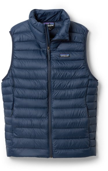 Front view of men's vest in dark navy showing zippered pockets and quilted pattern