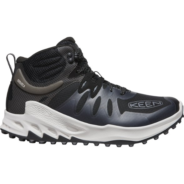Side view of TrailSpring Mid Waterproof Boots showing rugged outsole and breathable mesh upper