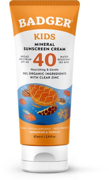Front view of Sunshield SPF 40 kids mineral sunscreen tube on beach towel