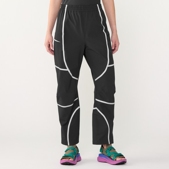 TrailBlazer Women's Hiking Pants in action on a sunny trail with a relaxed fit.