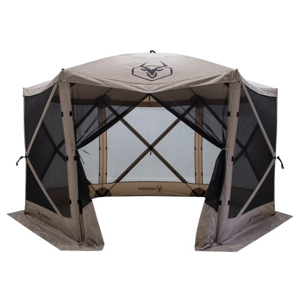 Angled view showing the SummitShield G6 fully set up on grass with picnic table underneath – ideal backyard canopy for gatherings.
