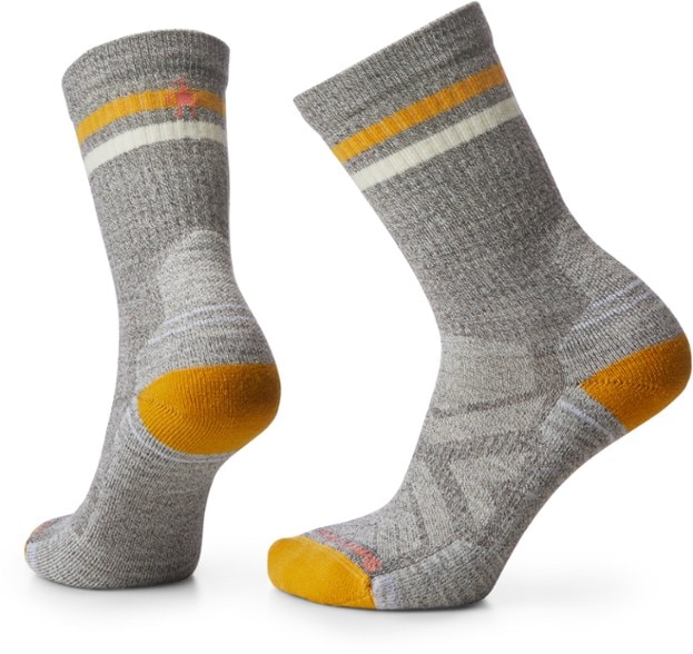 Close-up of women's retro stripe merino wool hiking socks, showcasing the unique design and texture.