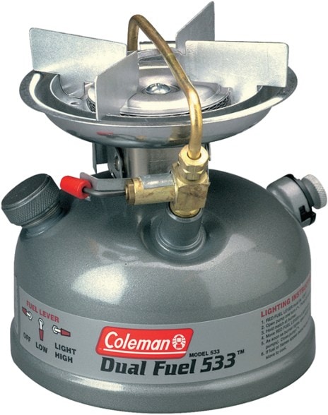 Coleman Dual Fuel Stove with wind baffles protecting the flame during outdoor cooking
