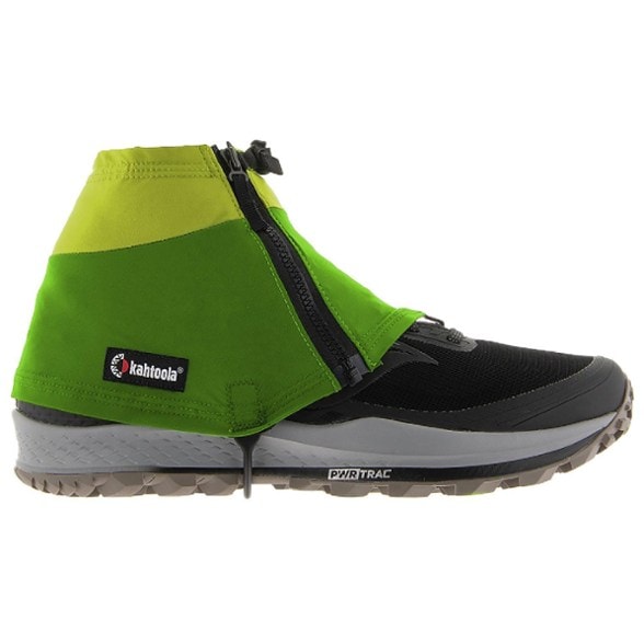 Kahtoola INSTAgaiter Low gaiters against a mountain backdrop, highlighting their rugged design.